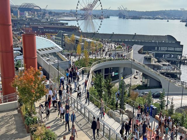 Visitors exploring Seattle waterfront's new Overlook Walk